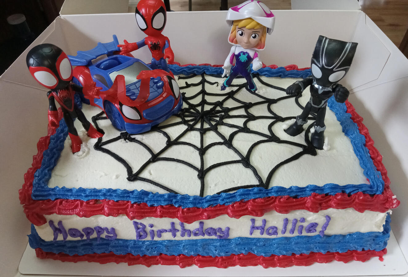 Spidey and friends cake. You buy the toppers.