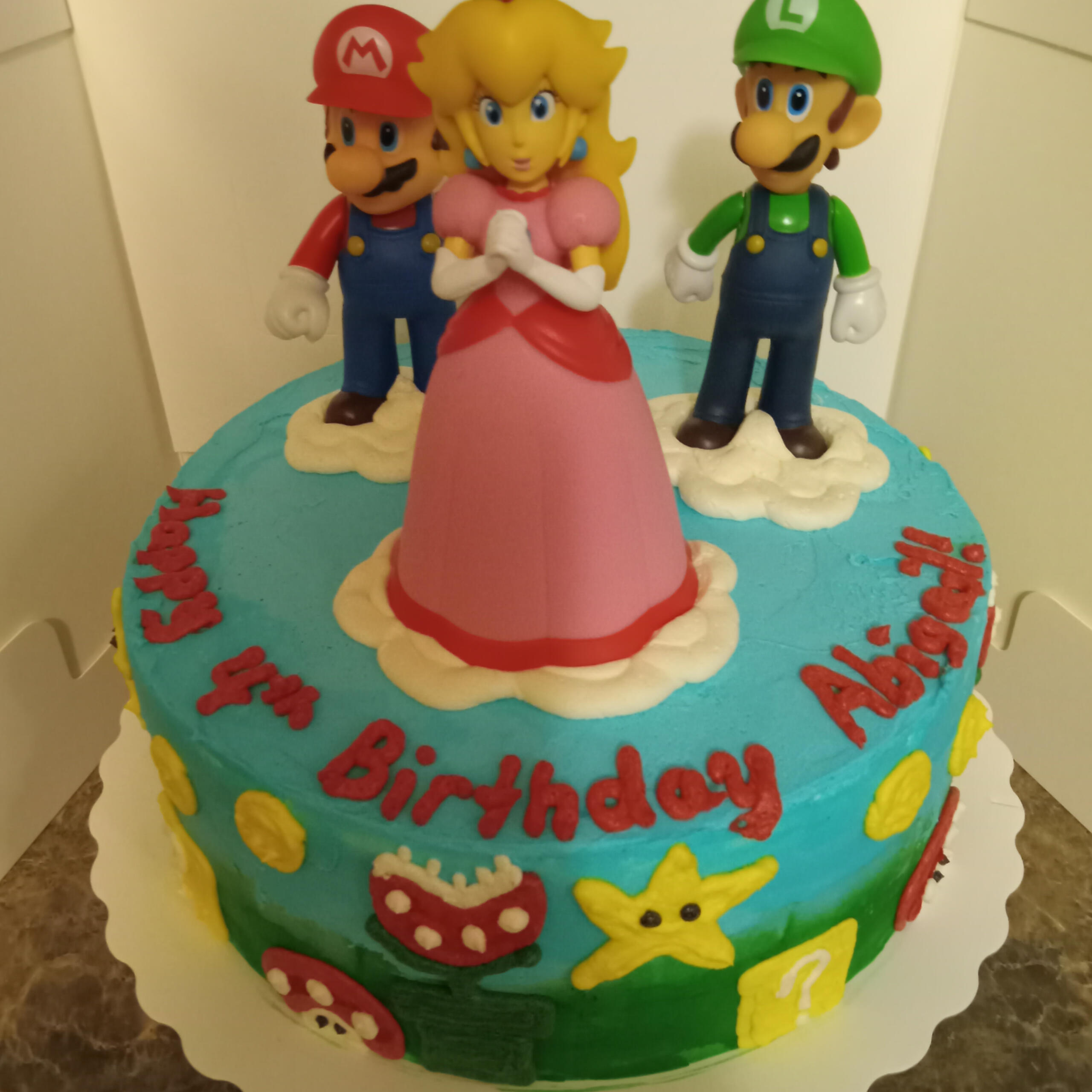 Tiered 7 and 8 inch double layer Mario cake $32
