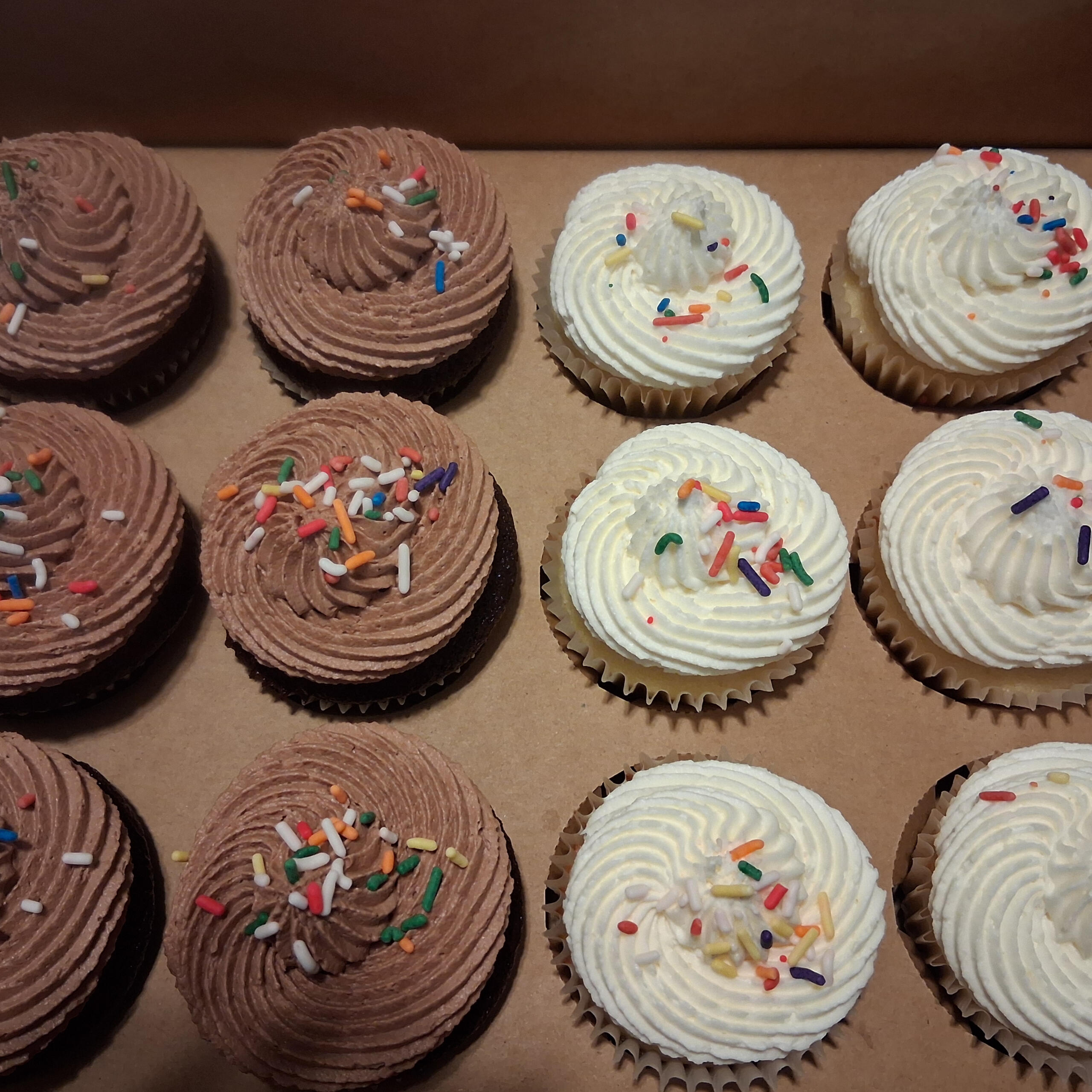 12 cupcakes half vanilla, half chocolate, $24